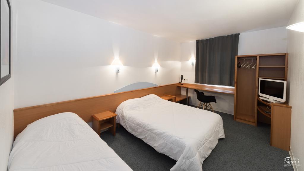 Hotel First Rodez Quarto foto